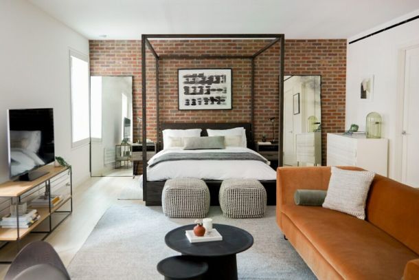 Our spacious, private studio is right across from Central Park and features comfy furniture and an exposed brick wall.